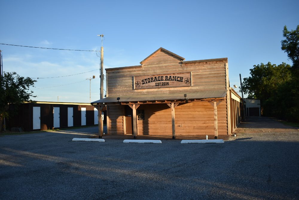 Image of the front of Storage Ranch's Duncan location. The building's architecture is classic western.